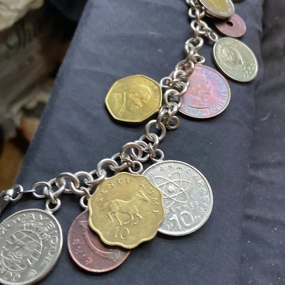 925 sterling silver coin charm bracelet 11 of them on here milor bracelet